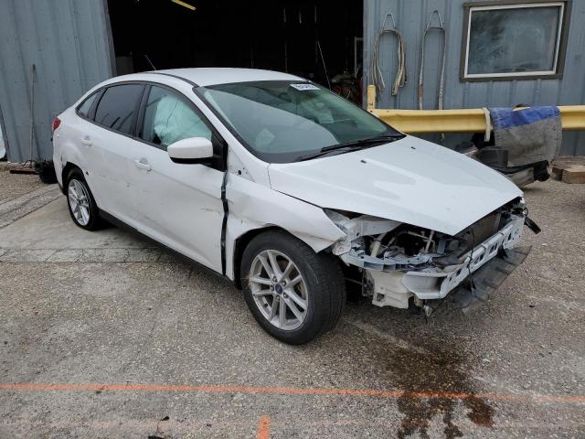FORD FOCUS SE 2018 with VIN 1FADP3F27JL272736 - Photo from auction