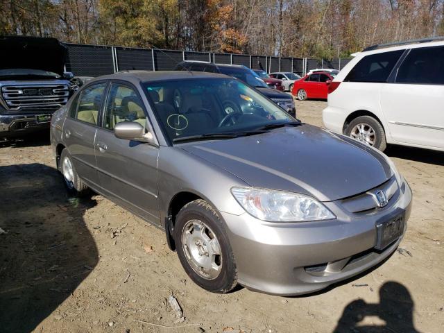 Photo 1 from auction – 2004 HONDA CIVIC HYBR with VIN JHMES95674S004119