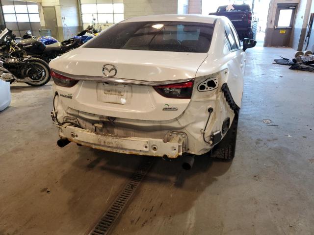Photo 9 from auction – 2014 MAZDA 6 TOURING with VIN JM1GJ1T5XE1110550