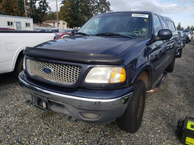 Photo 2 from auction – 2000 FORD F150 with VIN 1FTRX18LXYNA83846