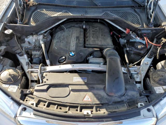 Photo 7 from auction – 2014 BMW X5 XDRIVE3 with VIN 5UXKR0C5XE0K50907