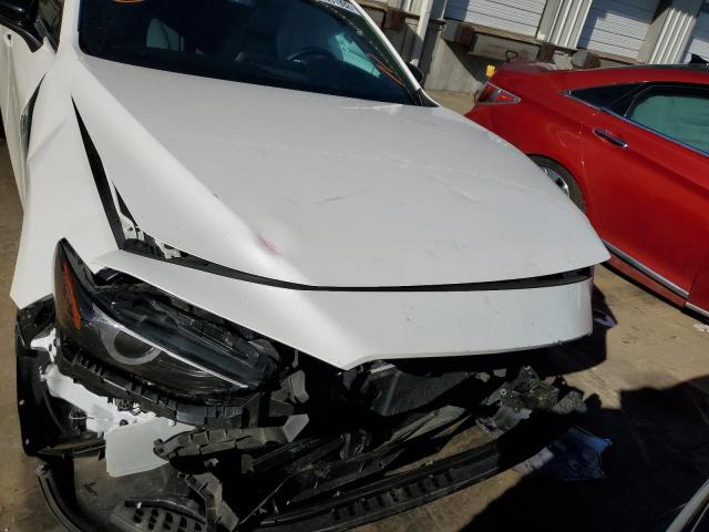 Photo 9 from auction – 2021 MAZDA 3 with VIN JM1BPBJY8M1318730