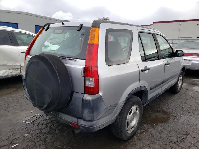 Photo 4 from auction – 2002 HONDA CR-V LX with VIN JHLRD68402C014619