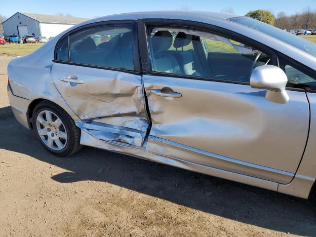 Photo 9 from auction – 2011 HONDA CIVIC LX with VIN 19XFA1F56BE015855