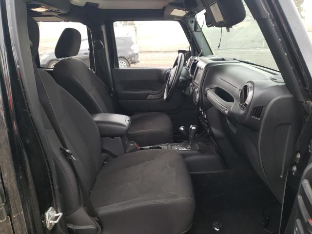Photo 5 from auction – 2016 JEEP WRANGLER U with VIN 1C4BJWDG6GL320352