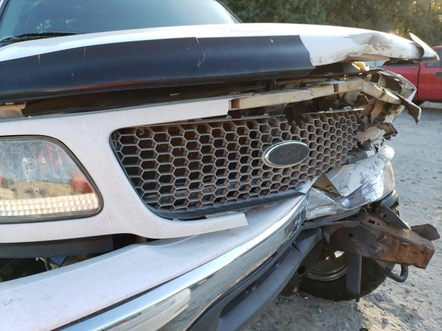 Photo 9 from auction – 2000 FORD F150 with VIN 1FTRX18L9YNA95468