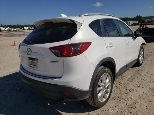 Photo 4 from auction – 2014 MAZDA CX-5 GT with VIN JM3KE2DY9E0385093