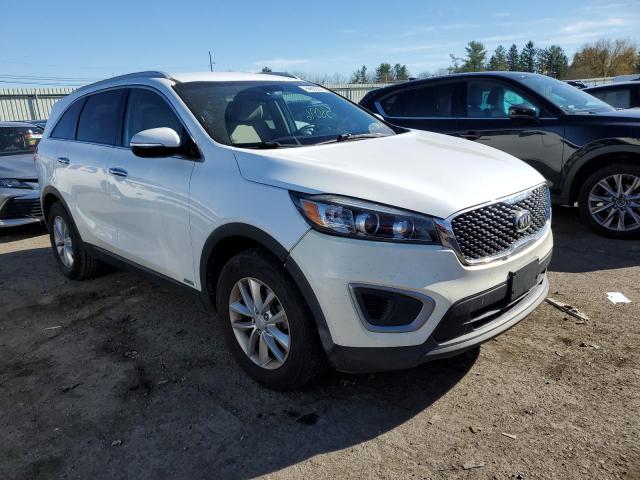 KIA SORENTO LX 2016 with VIN 5XYPGDA38GG061756 - Photo from auction