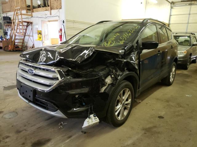 Photo 2 from auction – 2018 FORD ESCAPE SE with VIN 1FMCU9GDXJUC59891