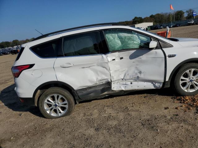 Photo 9 from auction – 2018 FORD ESCAPE SE with VIN 1FMCU9G98JUB48767