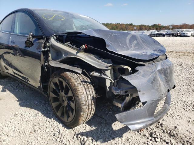 Photo 9 from auction – 2020 TESLA MODEL Y with VIN 5YJYGDEE3LF048852