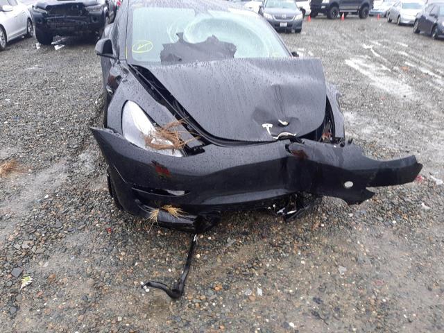 Photo 9 from auction – 2022 TESLA MODEL 3 with VIN 5YJ3E1EB4NF199643