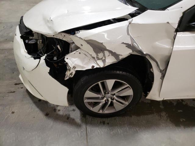 Photo 9 from auction – 2014 TOYOTA COROLLA EC with VIN 5YFBPRHE1EP013068