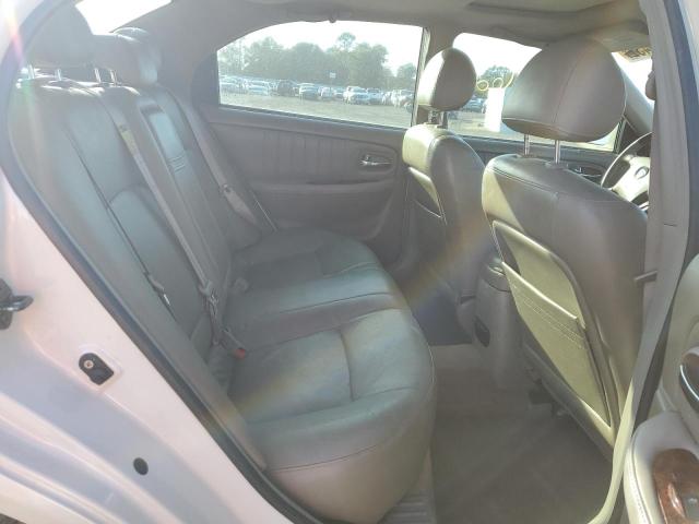 Photo 6 from auction – 2003 KIA OPTIMA LX with VIN KNAGD128035202109