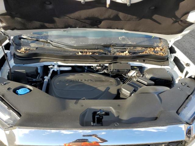 Photo 7 from auction – 2022 HONDA PASSPORT E with VIN 5FNYF7H55NB006461