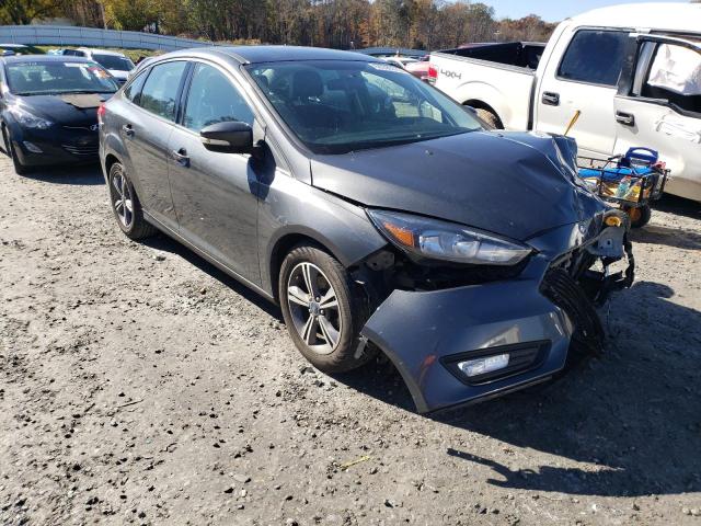 FORD FOCUS SE 2017 with VIN 1FADP3FE4HL330936 - Photo from auction