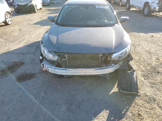 Photo 9 from auction – 2016 HONDA CIVIC LX with VIN 19XFC2F59GE083879