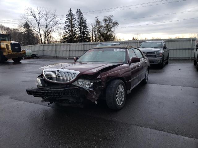 Photo 2 from auction – 2004 LINCOLN TOWN CAR E with VIN 1LNHM81W54Y601772