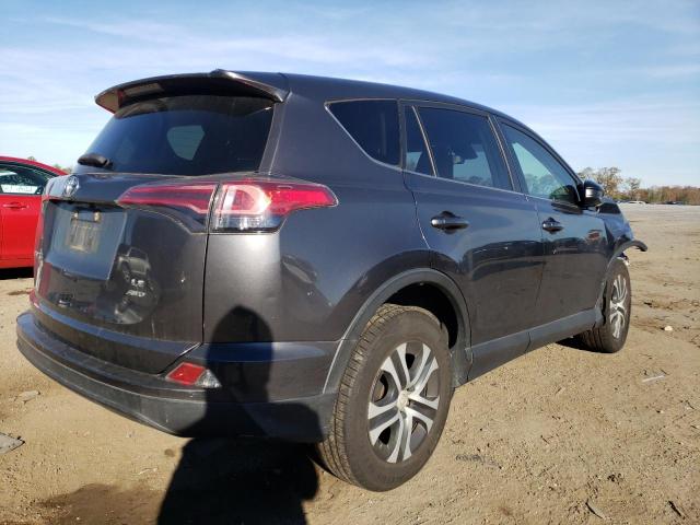 Photo 4 from auction – 2018 TOYOTA RAV4 LE with VIN JTMBFREV5JJ196271