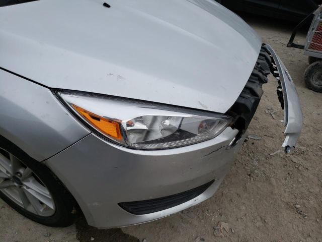 Photo 9 from auction – 2017 FORD FOCUS SE with VIN 1FADP3F28HL324658