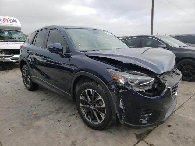 Photo 4 from auction – 2016 MAZDA CX-5 GT with VIN JM3KE2DY4G0860149