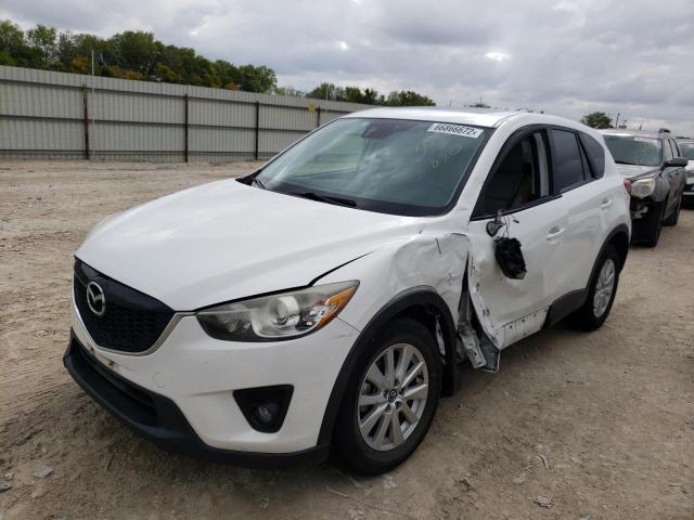 Photo 2 from auction – 2014 MAZDA CX-5 TOURI with VIN JM3KE2CY1E0304850