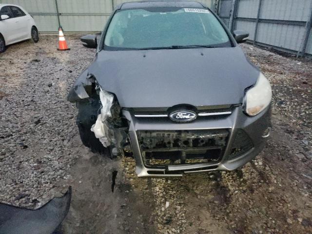Foto 9 de la subasta – 2013 FORD FOCUS SE con VIN 1FADP3F24DL308869