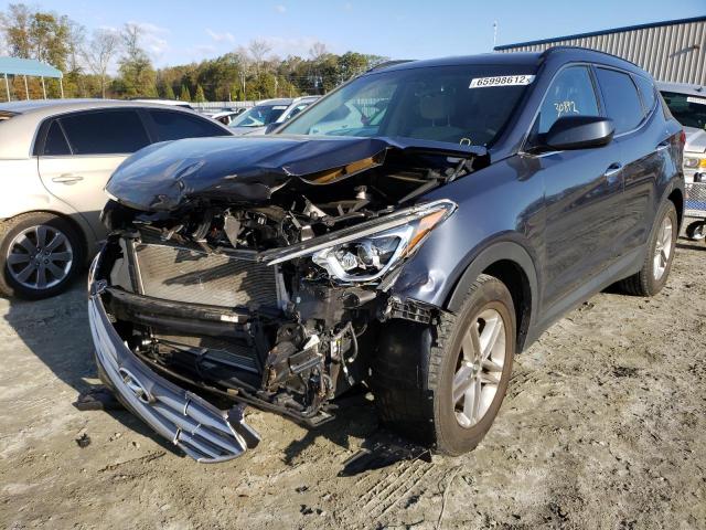 Photo 2 from auction – 2017 HYUNDAI SANTA FE S with VIN 5NMZU3LB0HH031514