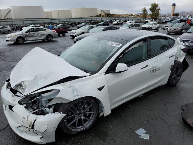 Photo 9 from auction – 2021 TESLA MODEL 3 with VIN 5YJ3E1EA5MF930604