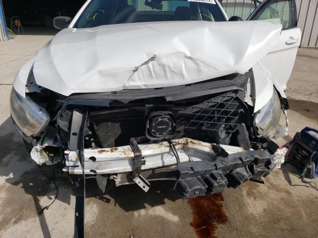Photo 7 from auction – 2014 FORD TAURUS POL with VIN 1FAHP2L87EG178620