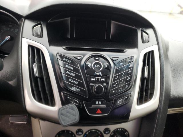 Photo 9 from auction – 2014 FORD FOCUS SE with VIN 1FADP3F28EL113178