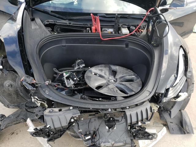 Photo 11 from auction – 2018 TESLA MODEL 3 with VIN 5YJ3E1EAXJF056956