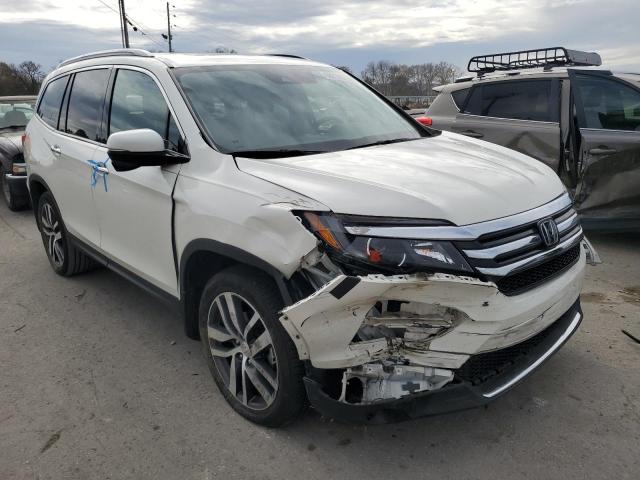 HONDA PILOT TOUR 2017 with VIN 5FNYF6H97HB090168 - Photo from auction