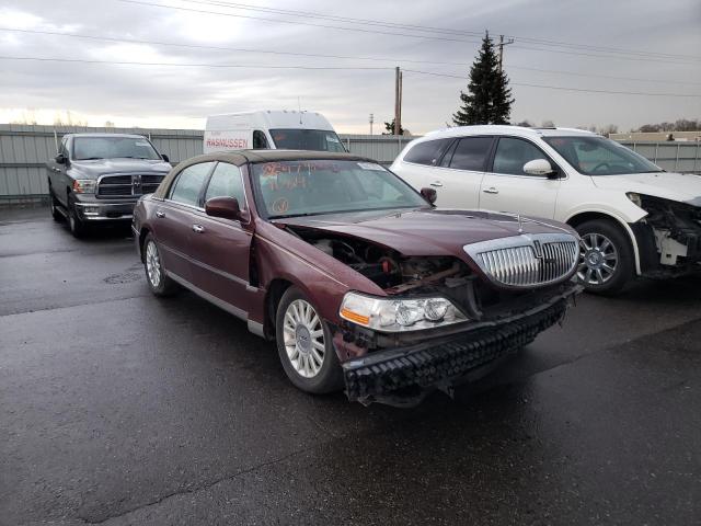LINCOLN TOWN CAR E 2004 with VIN 1LNHM81W54Y601772 - Photo from auction