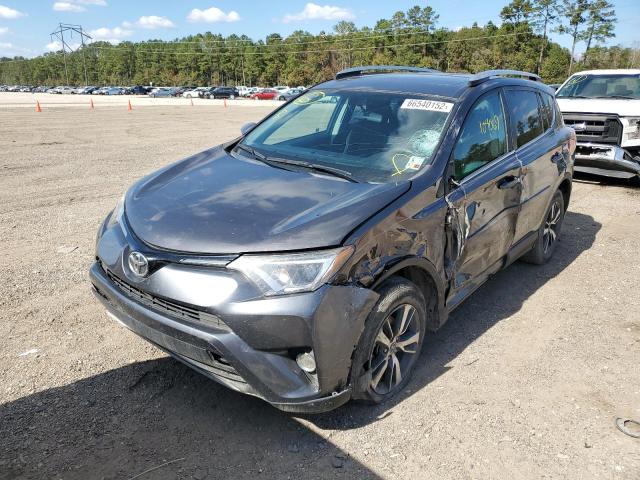 Photo 2 from auction – 2016 TOYOTA RAV4 XLE with VIN 2T3WFREV7GW264940