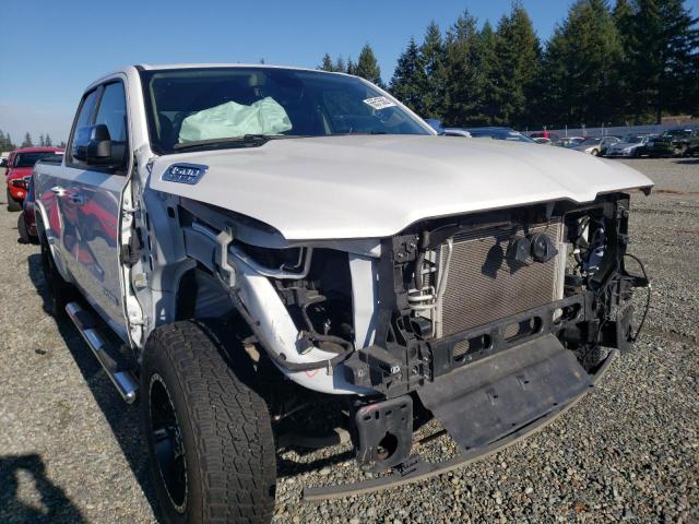 RAM 1500 LARAM 2020 with VIN 1C6SRFDT8LN280660 - Photo from auction