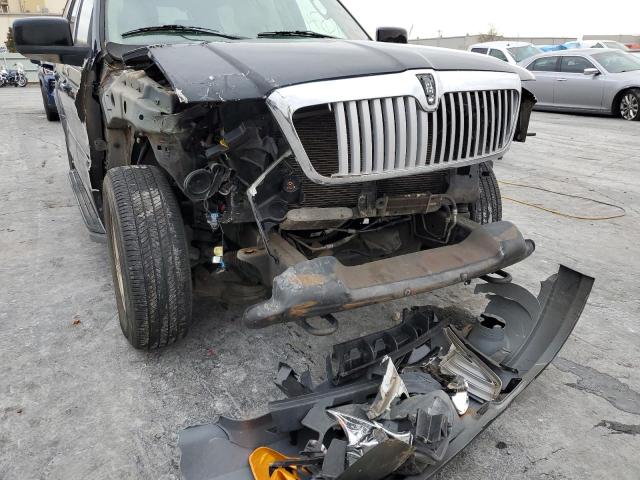 Photo 9 from auction – 2004 LINCOLN NAVIGATOR with VIN 5LMFU27R74LJ31034