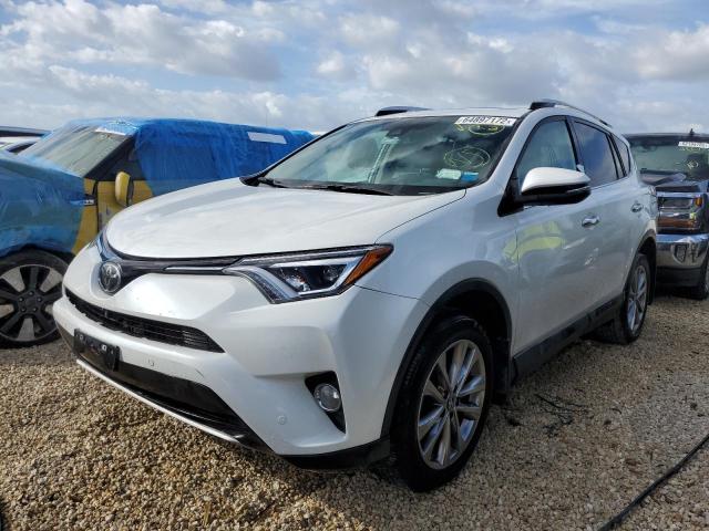 Photo 2 from auction – 2016 TOYOTA RAV4 LIMIT with VIN 2T3DFREV9GW460031