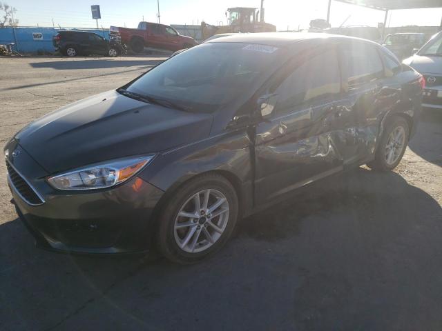 FORD FOCUS SE 2015 with VIN 1FADP3F22FL206974 - Photo from auction