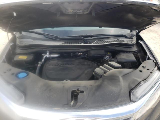 Photo 7 from auction – 2022 HONDA PILOT TOUR with VIN 5FNYF5H64NB004150