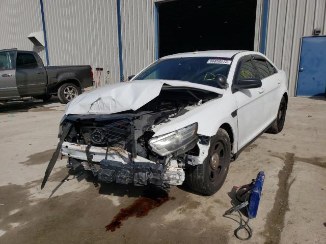 Photo 2 from auction – 2014 FORD TAURUS POL with VIN 1FAHP2L87EG178620