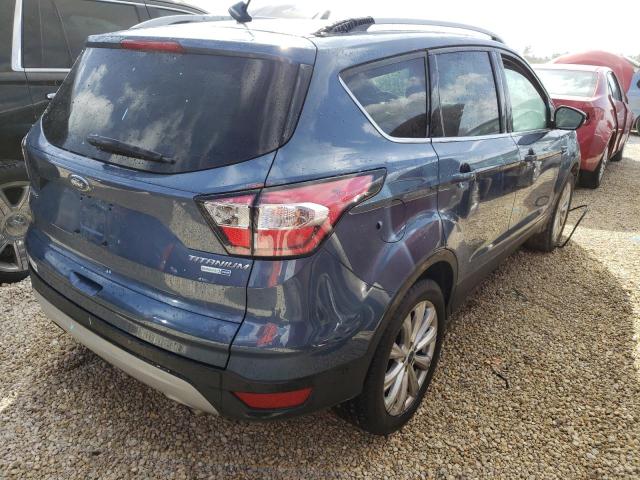 Photo 4 from auction – 2018 FORD ESCAPE TIT with VIN 1FMCU9J93JUB92264