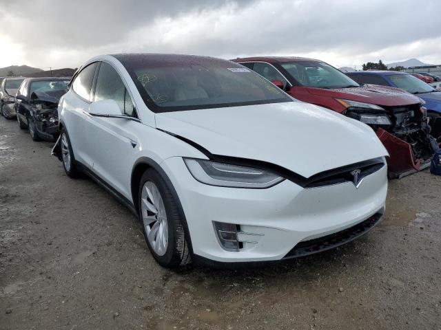 TESLA MODEL X 2021 with VIN 5YJXCDE25MF305654 - Photo from auction