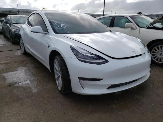 TESLA MODEL 3 2020 with VIN 5YJ3E1ECXLF587093 - Photo from auction