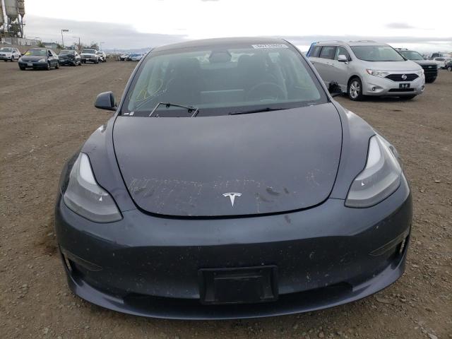 Photo 5 from auction – 2022 TESLA MODEL 3 with VIN 5YJ3E1EA2NF144938