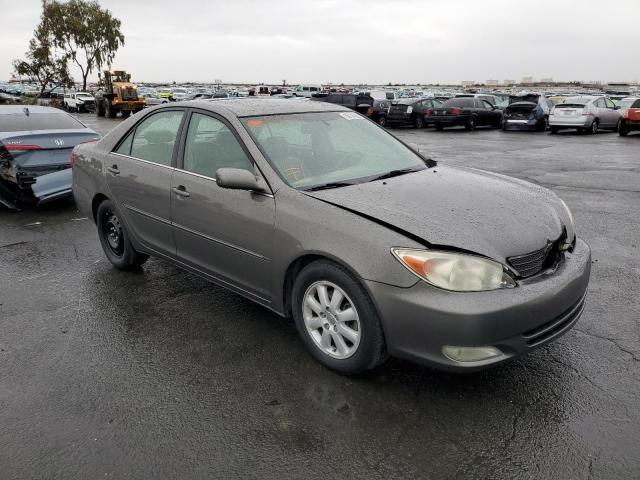 TOYOTA CAMRY LE 2003 with VIN 4T1BF30K63U555120 - Photo from auction