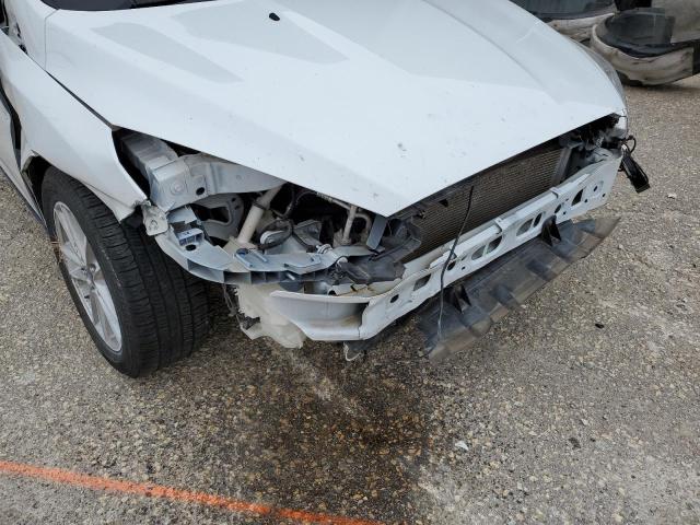 Photo 9 from auction – 2018 FORD FOCUS SE with VIN 1FADP3F27JL272736