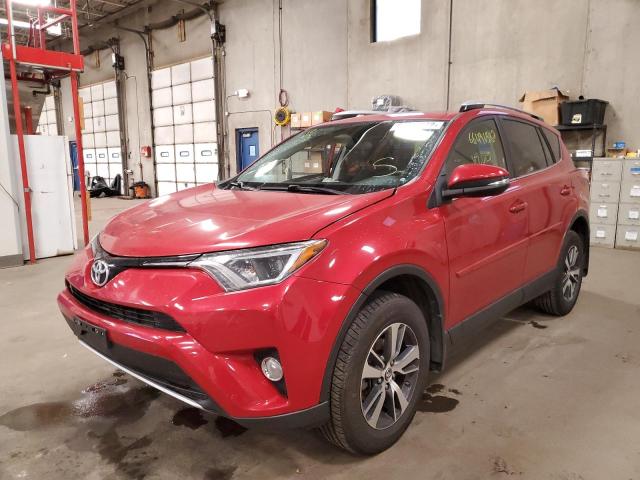 Photo 2 from auction – 2016 TOYOTA RAV4 XLE with VIN JTMRFREV4GJ078266