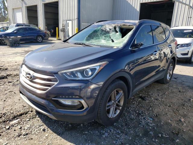 Photo 2 from auction – 2017 HYUNDAI SANTA FE S with VIN 5NMZU3LBXHH017653