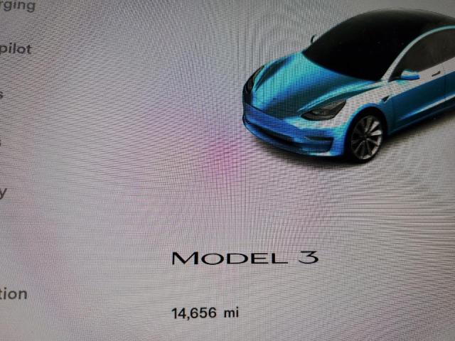 Photo 9 from auction – 2022 TESLA MODEL 3 with VIN 5YJ3E1EA2NF144938